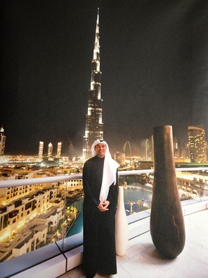 Mohamed Alabbar, Chairman of Emaar Properties standing in front of Burj Khalifa